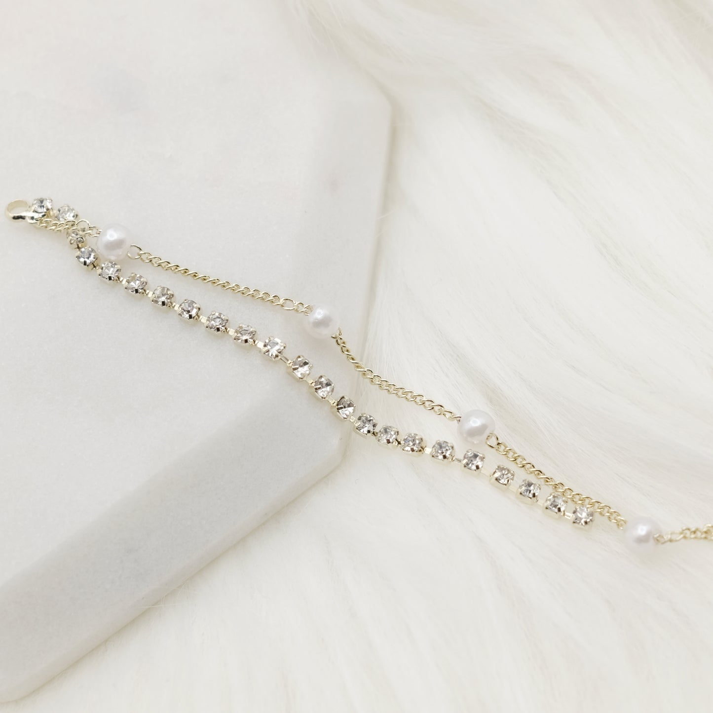 Gleaming Strand Charm