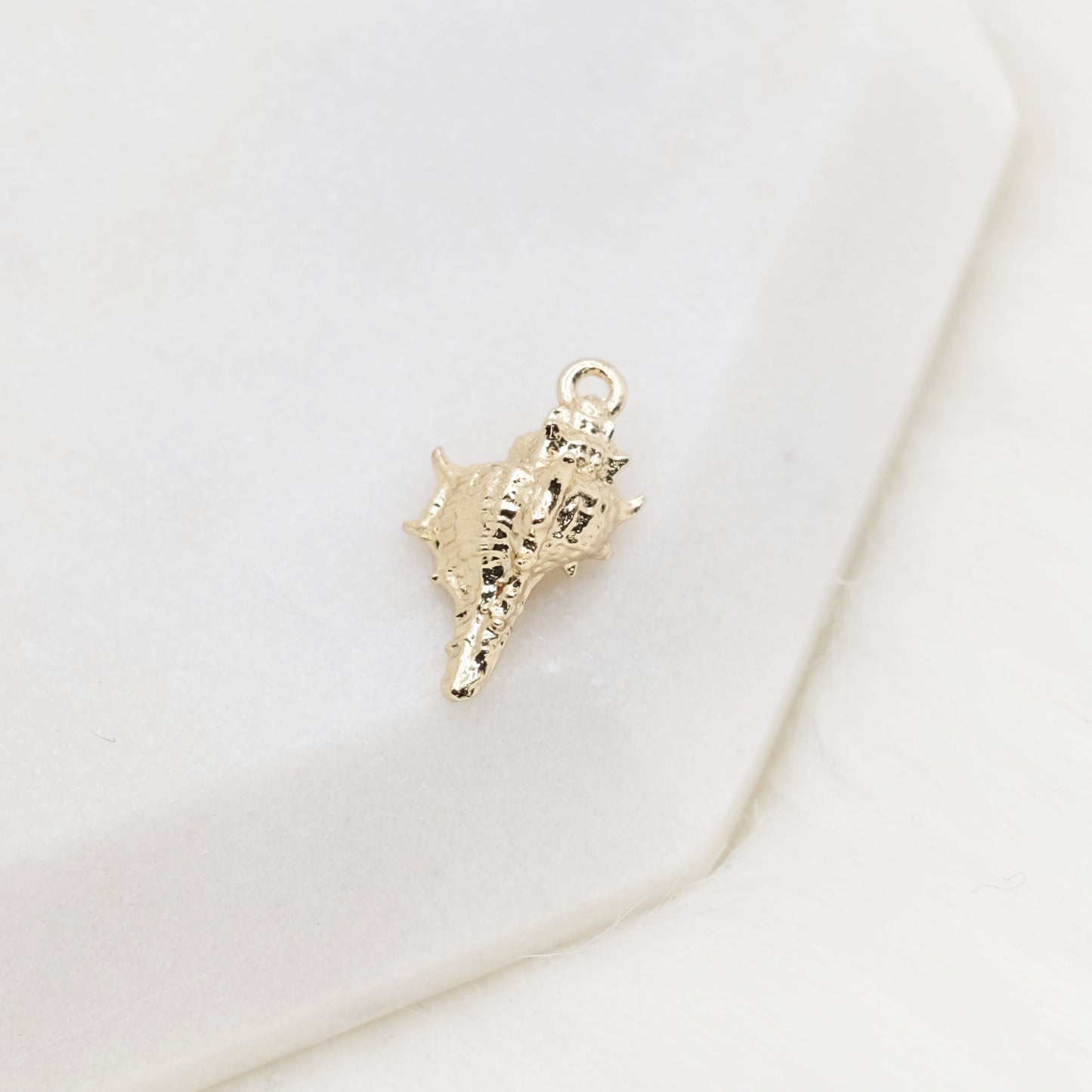 Call of the Conch Charm