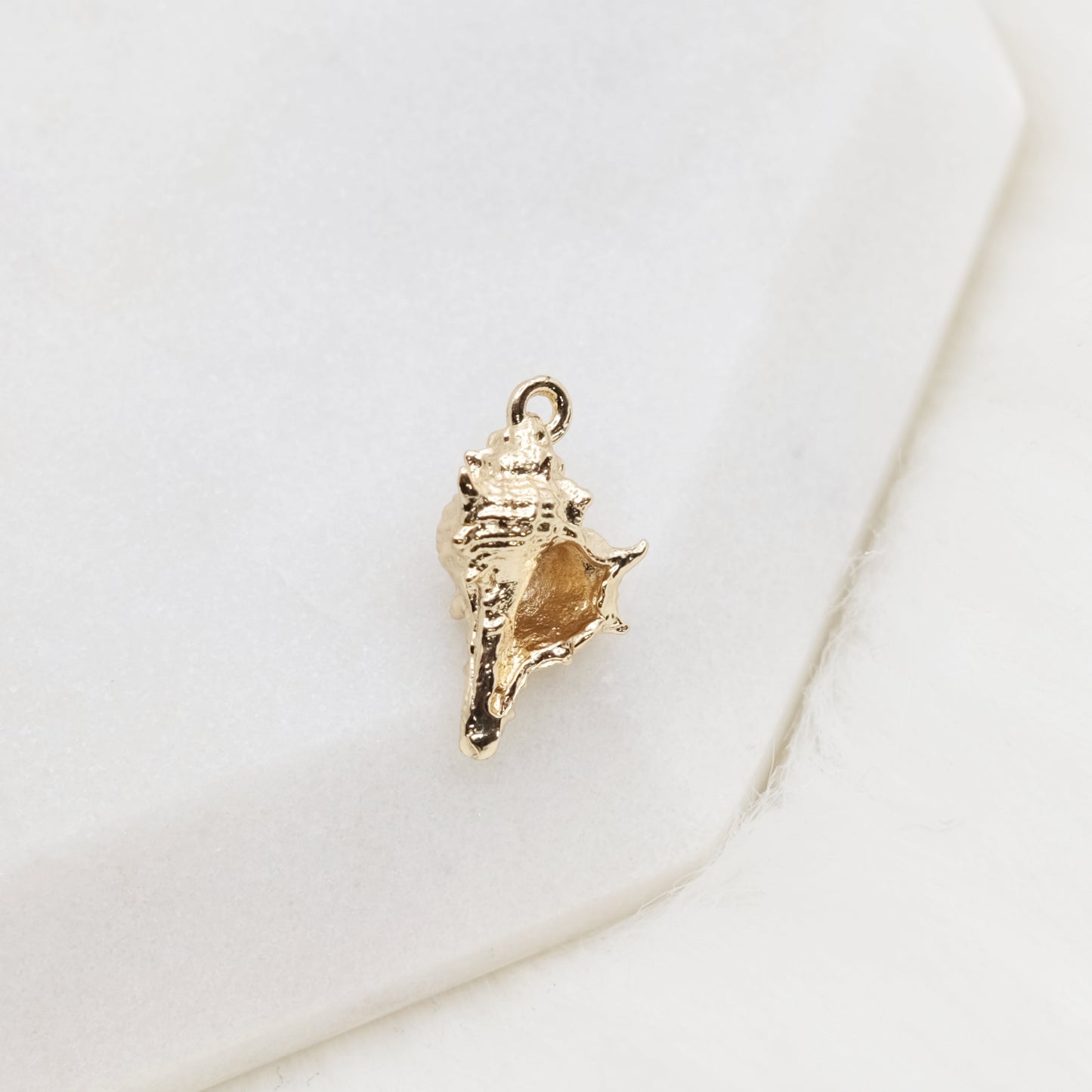Call of the Conch Charm