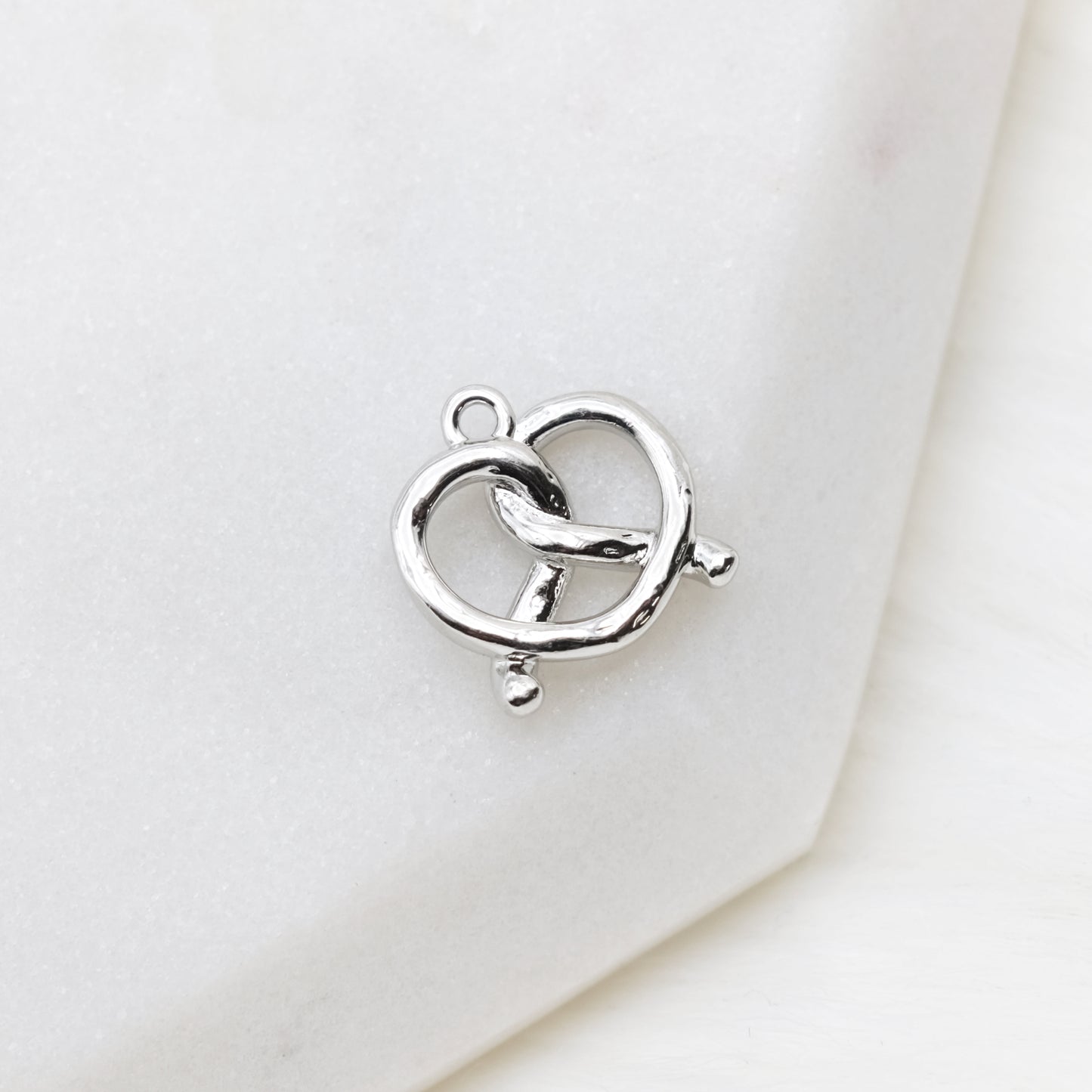 Chrome Knot Charm